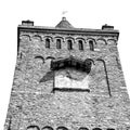 ancien clock tower in italy europe old stone and bell Royalty Free Stock Photo