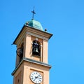 ancien clock tower in italy europe old stone and bell Royalty Free Stock Photo
