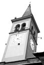 ancien clock tower in italy europe old stone and bell Royalty Free Stock Photo