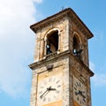 ancien clock tower in italy europe old stone and bell Royalty Free Stock Photo