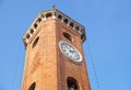 Ancien clock tower in italy europe old stone and bell Royalty Free Stock Photo