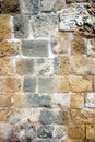 Ancien wall from brown stones front view