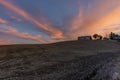 Ancient abandoned stone farmhouse at sunset, Sienese countryside, Tuscany, Italy Royalty Free Stock Photo