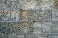 Ancient aged stone tiled texture as wall with copy space