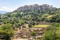 Ancient Agora in Athens, Greece. Scenic view of Greek ruins and Acropolis in distance Royalty Free Stock Photo