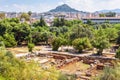 Ancient Agora in Athens, Greece. View of Greek ruins and Mount Lycabettus in distance