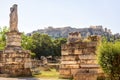 Ancient Agora in summer, Athens, Greece. Classical Greek ruins overlooking Acropolis hill. Urban landscape of old Athens city Royalty Free Stock Photo