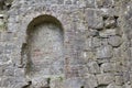 Ancient alcove in a Medieval castle wall in rural Ireland