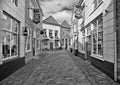 Ancient alley with lovely shops in the touristic ancient city of Heusden, The Netherlands.