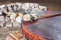 Ancient amerindian tambourine and drum drumstick replica