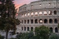 Colosseum in Rome, Italy Ancient architecture with visitors and greenery at twilight. Royalty Free Stock Photo