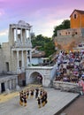 Ancient amphitheater stage dancers