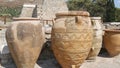 Ancient amphoras on the territory famous Knossos Palace of King Minos where, Theseus killed the Minotaur. The ruins of