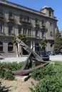 Ancient anchor in the street of Barcelona.