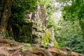 Giant face of temple gate around angkor wat temple area Royalty Free Stock Photo