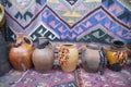 Clay pots jugs dried fruit background