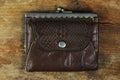 Old leather purse with ancient chinks Royalty Free Stock Photo