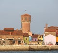 Ancient aqueduct tower in the Burano Island near Venice Royalty Free Stock Photo