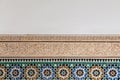 Ancient Arabian decoration pattern style on a white wall detail in Marrakesh Royalty Free Stock Photo