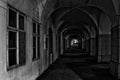 Ancient arcade in the center of Prague in black and white at night illuminated by street lights Royalty Free Stock Photo