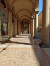 An ancient arcade in independence street in Bologna Italy Royalty Free Stock Photo