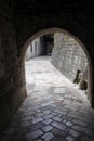 Ancient arch pathway on a Kotor old town Royalty Free Stock Photo