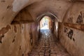 Ancient arched passage on a narrow paved historical street in Old Jaffa, Tel Aviv, Israel