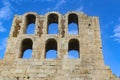 Ancient arches of the Roman theater on the Acropolis in Athens Greece against a beautiful blue sky with whispy clouds Royalty Free Stock Photo