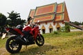 Ancient architecture antique building ubosot of Wat khien or Khian buddhist temple for thai people riding motorcycle sport travel