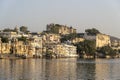Ancient architecture and lake water in city Udaipur, Rajasthan, India Royalty Free Stock Photo
