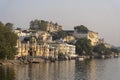 Ancient architecture and lake water in city Udaipur, Rajasthan, India Royalty Free Stock Photo