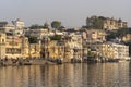 Ancient architecture and lake water in city Udaipur, Rajasthan, India Royalty Free Stock Photo