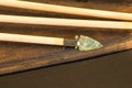 Ancient arrow with flint arrowhead Royalty Free Stock Photo