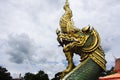 Ancient art of naga or antique naka statue of Wat Phra Kaew temple for thai people travelers travel visit and respect praying and Royalty Free Stock Photo