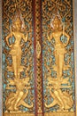 Ancient art pattern on the wooden door in Thai temple Royalty Free Stock Photo