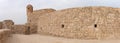 Ancient Bahrain Fort watch tower and the southern wall of the fort