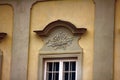 Ancient bas-reliefs on the Windows and walls of historical buildings Royalty Free Stock Photo