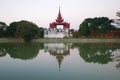 Ancient bastion of the old city with reflection in gray twilight. Mandalay, Burma