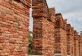 Ancient Battlements with crenellations on the wall made with old bricks Royalty Free Stock Photo