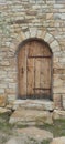 ancient beautiful door in stone wall
