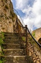 Ancient Beautiful stone steps with chain rail in Frias castle - fortress in Spain. Royalty Free Stock Photo
