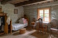 Ancient bedroom interior with antique furniture, wooden house in Rumsiskes Etnographic museum Lithuania