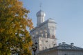 Ancient belfry of St. Sophia Cathedral in October morning fog. Veliky Novgorod Royalty Free Stock Photo