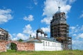 Ancient belltower and private case of the Mikhaylo-Klopsky monastery in the sunny June afternoon. Novgorod region