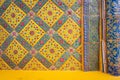Ancient Benjarong ceramic texture paint tiles patterns Thai style on the wall decorate of Wat Ratchabophit temple on panel