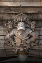 Ancient big statute of scary, fearful and heavy armed gatekeeper, medieval warrior with weapon in historical downtown of Dresden,