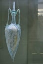 Ancient blue coloured, faded glass Amphorisk from 1st century AD