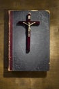 Ancient book and crucifix Royalty Free Stock Photo