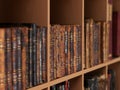 Ancient books on a a book shelves