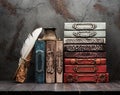 Ancient books, manuscript with a feather and antique inkwell Royalty Free Stock Photo